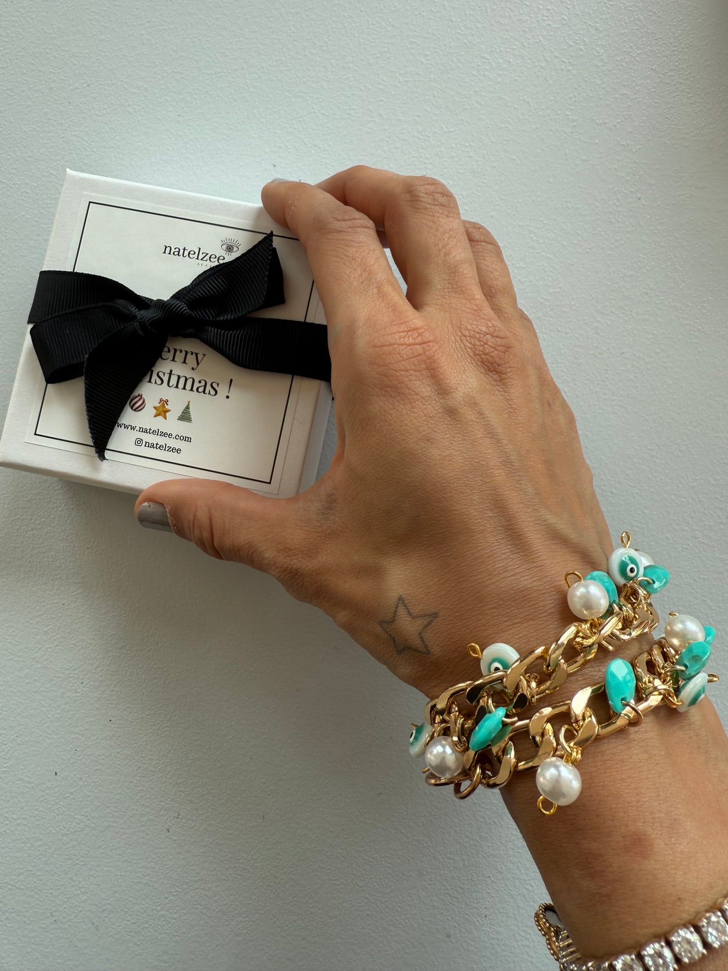 Gold and turquoise evil eye bauble wristlet