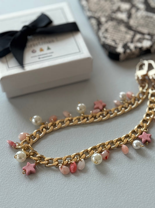 Gold and pink pearl and star bauble wristlet