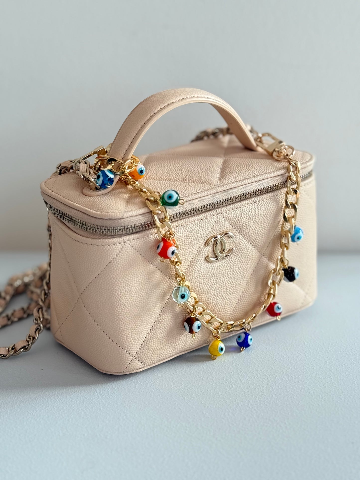 Gold and multi evil eye bauble wristlet